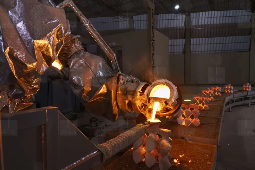 Investment casting robotic metal pouring